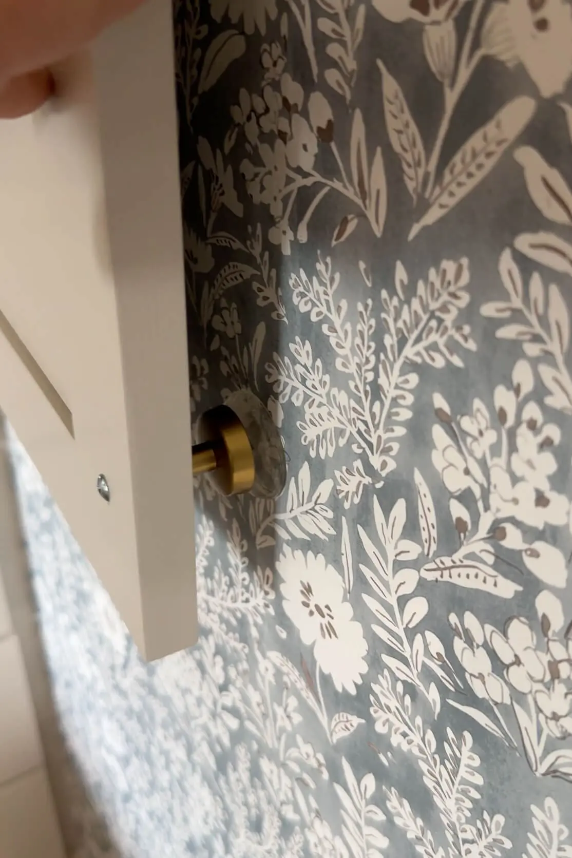 Clear bumper pads so cabinet handles don't damage the wall.